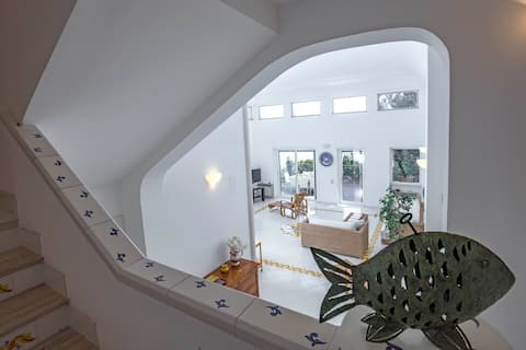 Villa with a view of the sea, terrace, and parking