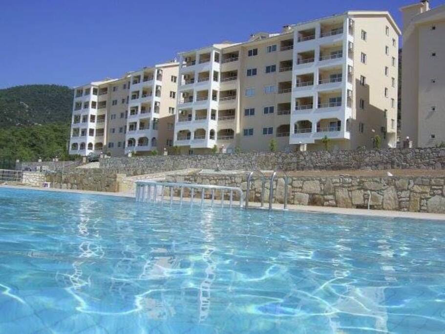 The apartment from the swimming pool.