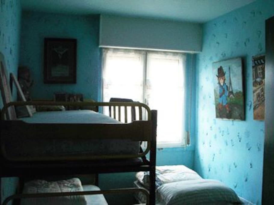 Dormitorio 3 camas