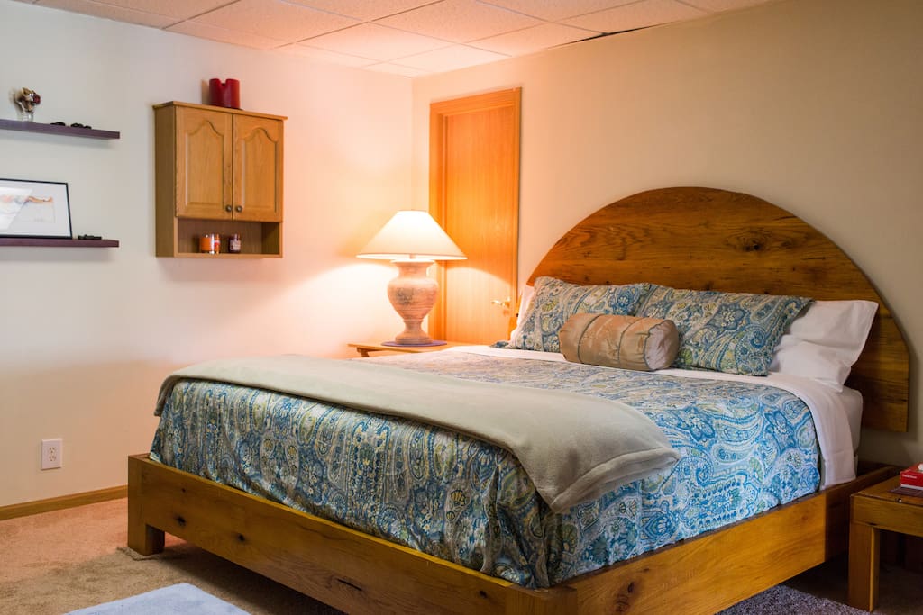 The spacious bedroom has a king bed.
