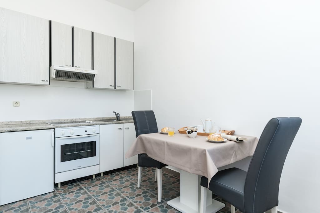 dining area with georgeous small kitchen with all necessary in it