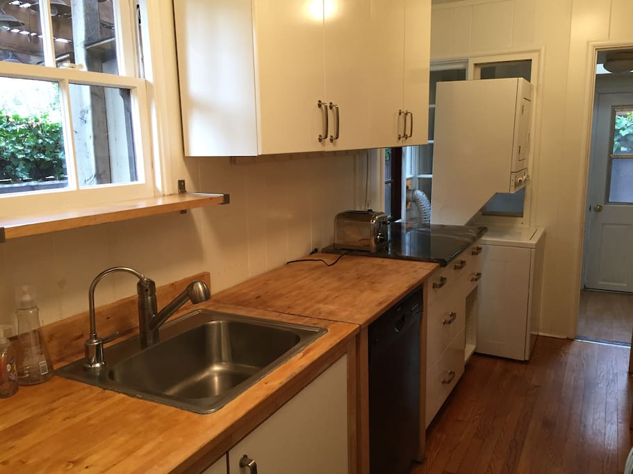 Kitchen Sink with Washer/Dryer at end of hall