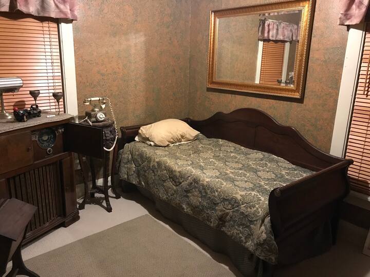 This is your second private bedroom. The room is located on the first floor right next to your private bathroom across the hall from your other private bedroom. Most guests sleep in the bigger bedroom and place their luggage in this room.