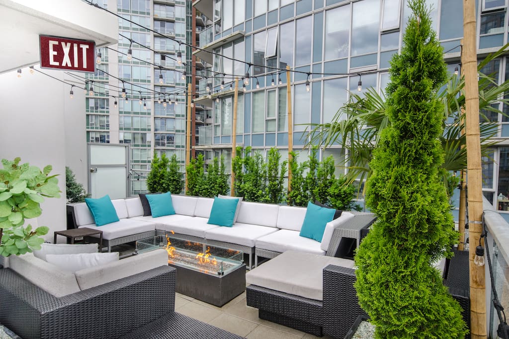 Our private rooftop patio complete with soft seating and outdoor fire table to watch the sun set and enjoy a glass of wine.