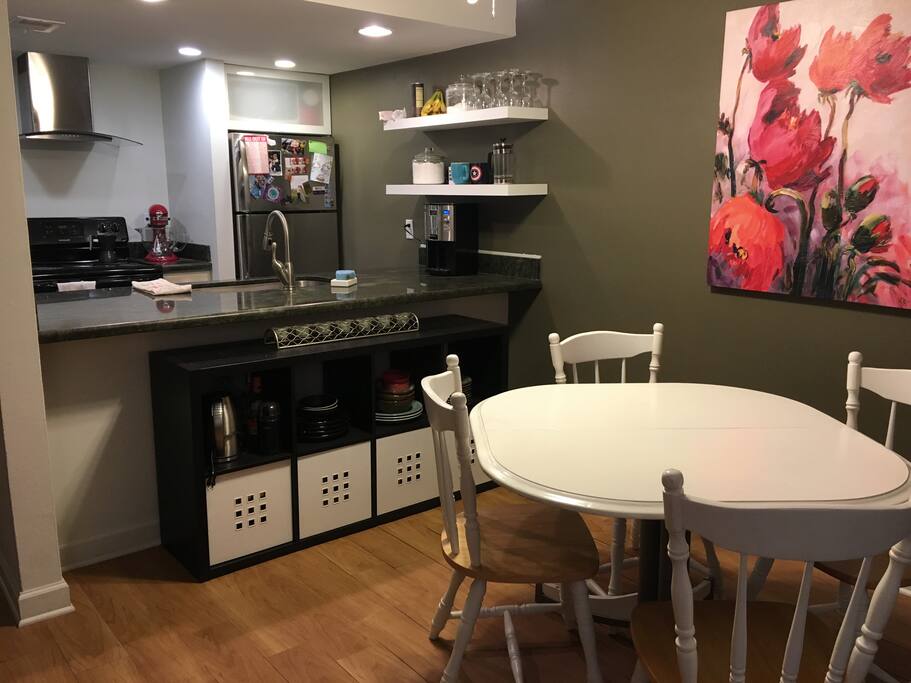 Kitchen supplies and bar area to dining space