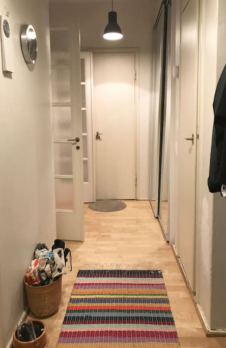 Built in the 1900's, our home is modest and cosy. To the left the kitchen and living room, ahead the bathroom.