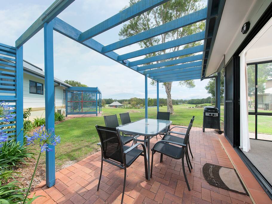 Outdoor courtyard with table and chairs