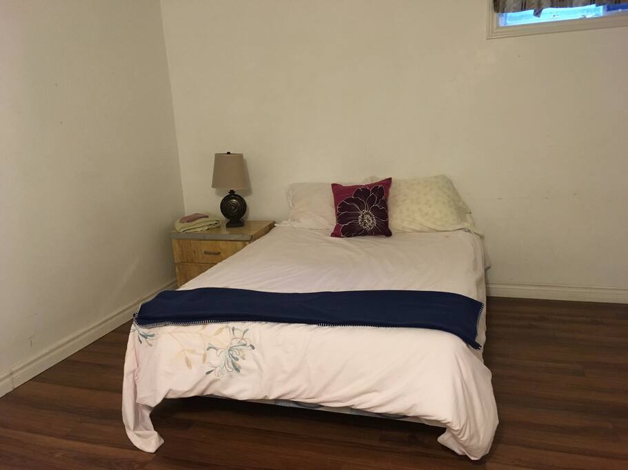 Bed and night stand with night lights