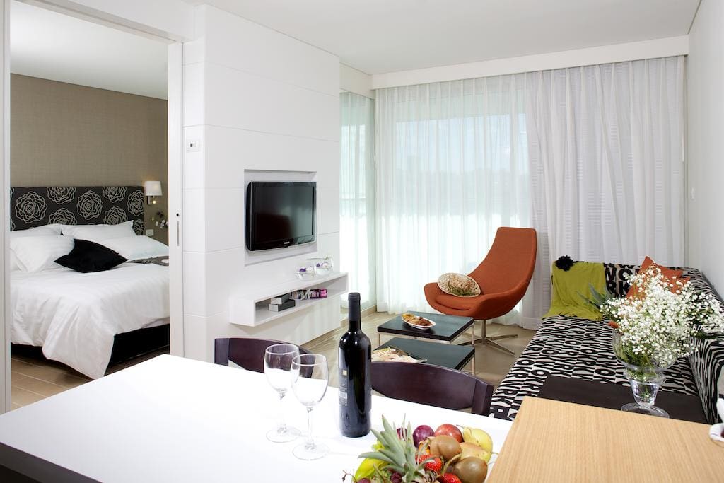 living room with 2 beds