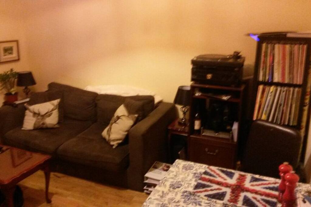 Lounge with TV, Sofabed, Dining table & Chairs