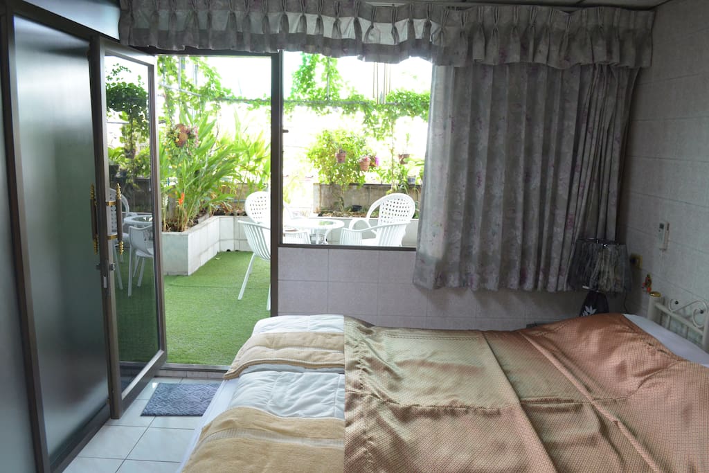 Queen Room with a little garden balcony.
