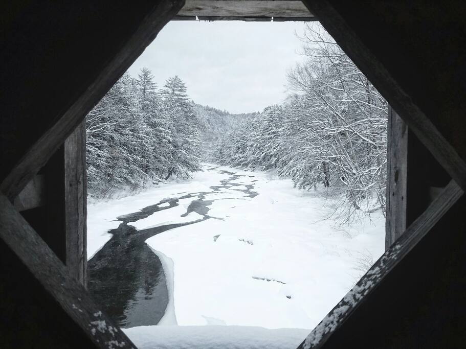 A view on the covered bridge on our road.