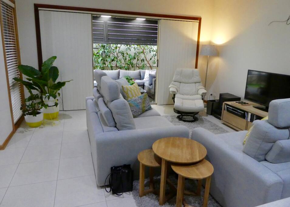 Relax in a comfortable entertainment TV space.