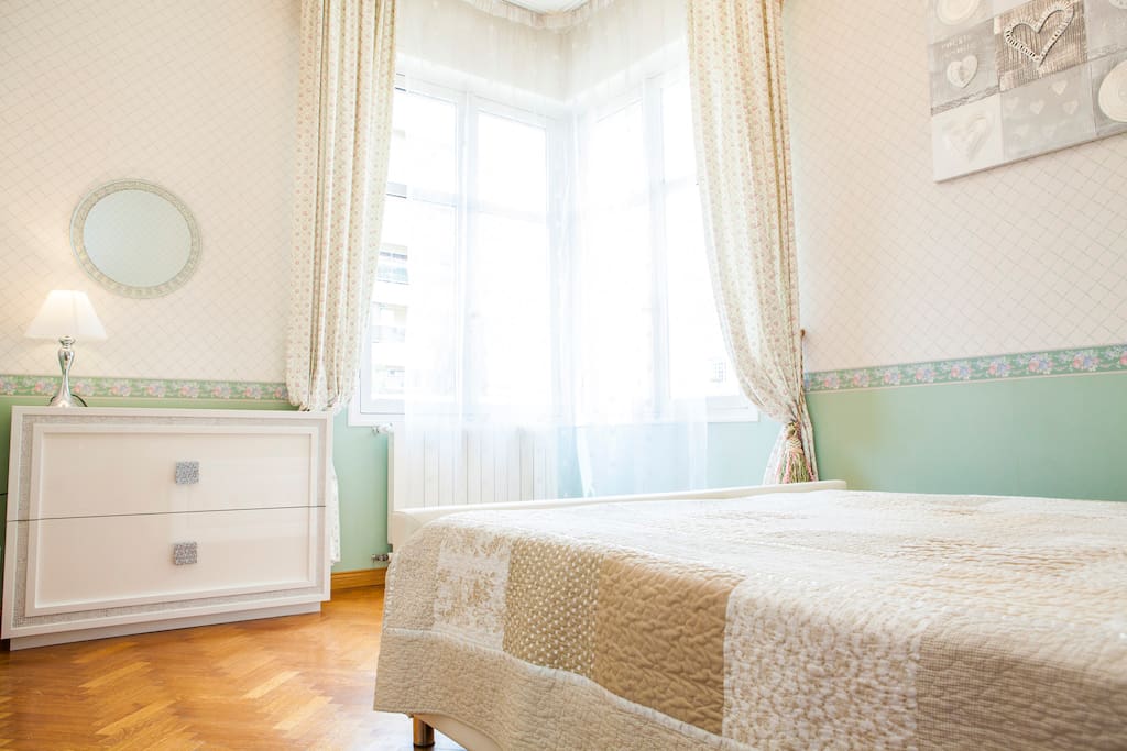 First bedroom with large double bed