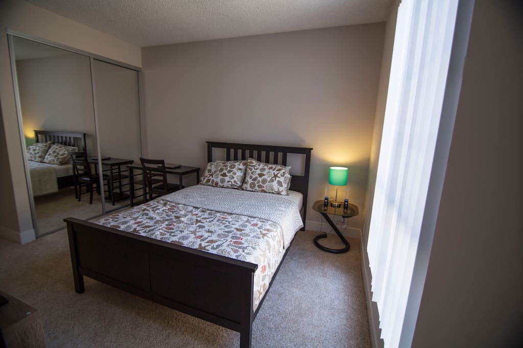 master bedroom with queen bed