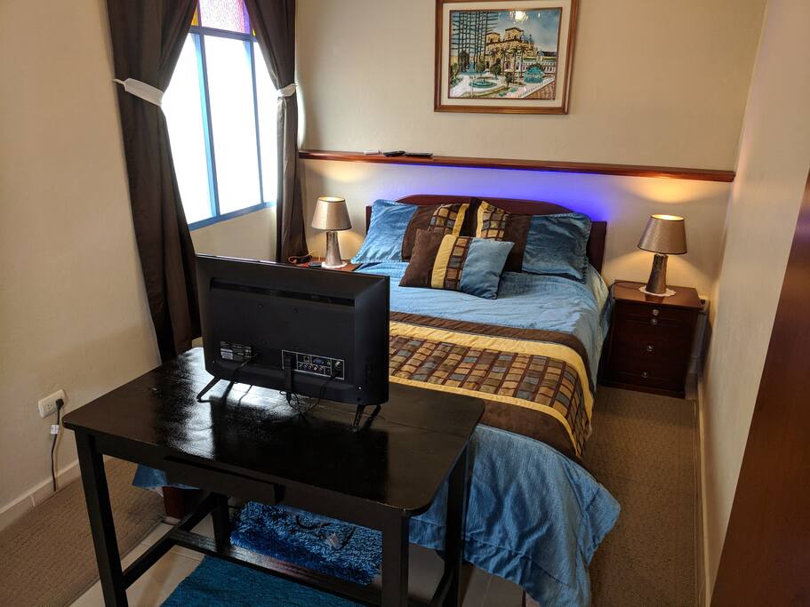 Bedroom with TV and ROKU