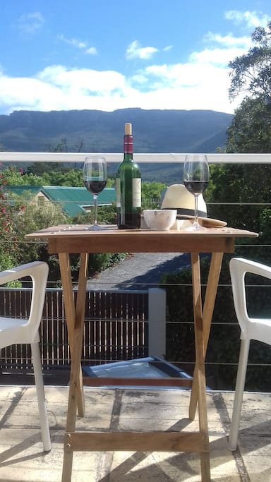 Relax on the balcony with a glass of wine