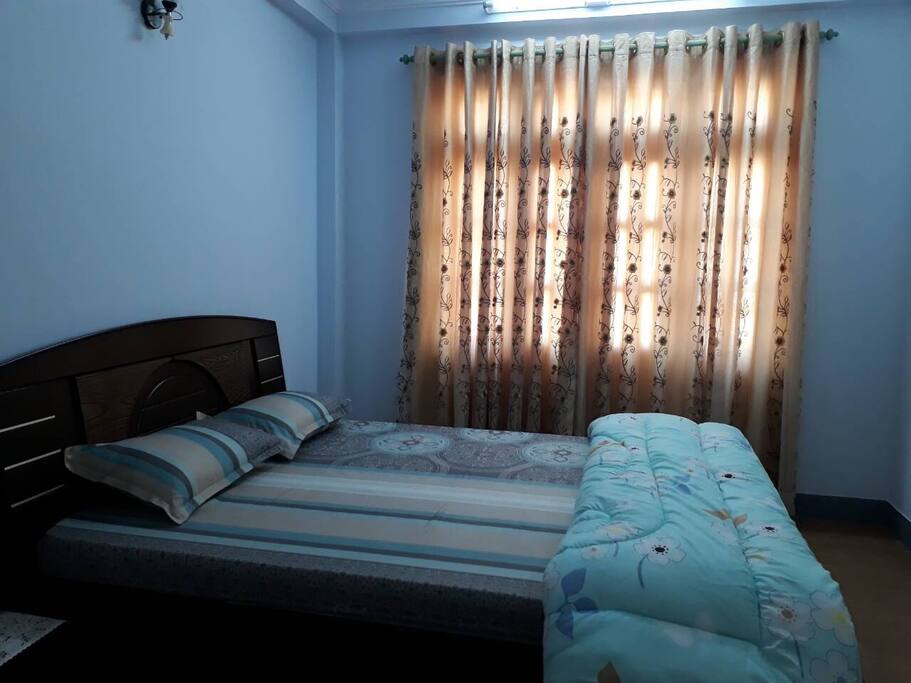 bedroom with balcony