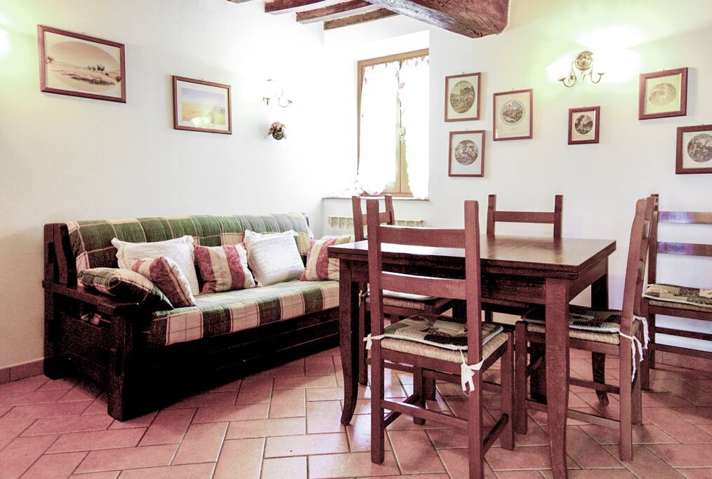 The Living Room showing the Dining Area.
