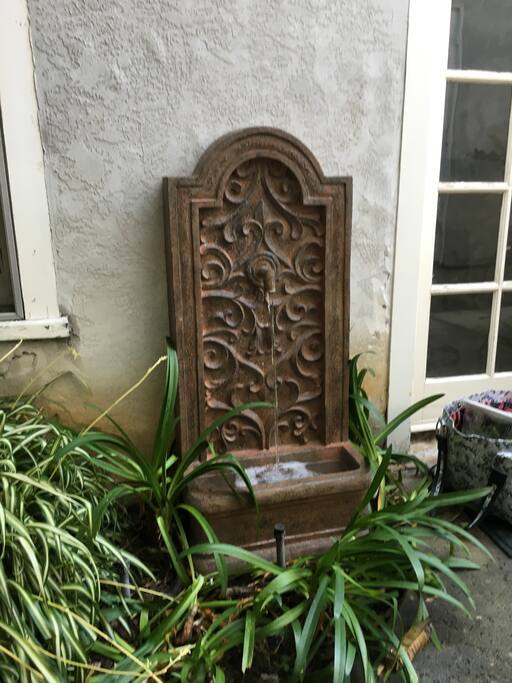 Fountain next to entry door
