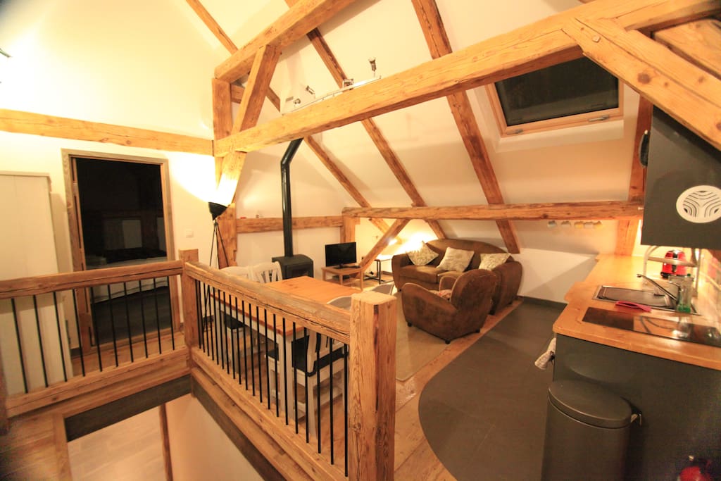 The living area with the bedrooms coming off either end and the entrance downstairs