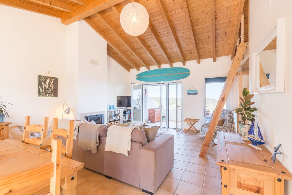 Open plan living room with the stairs set up for the mezzanine floor