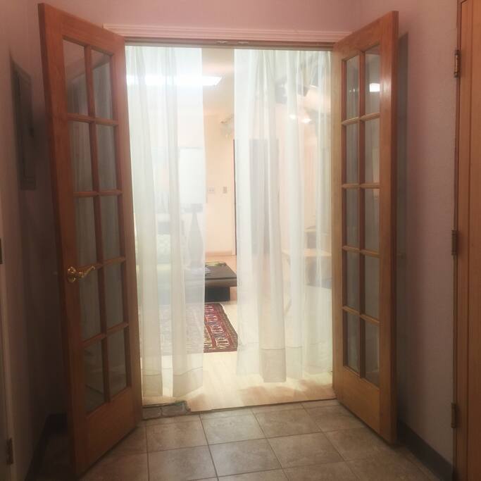Romantic French doors looking into the main room. Both doors can be opened providing a wide entrance and exit when needed.
