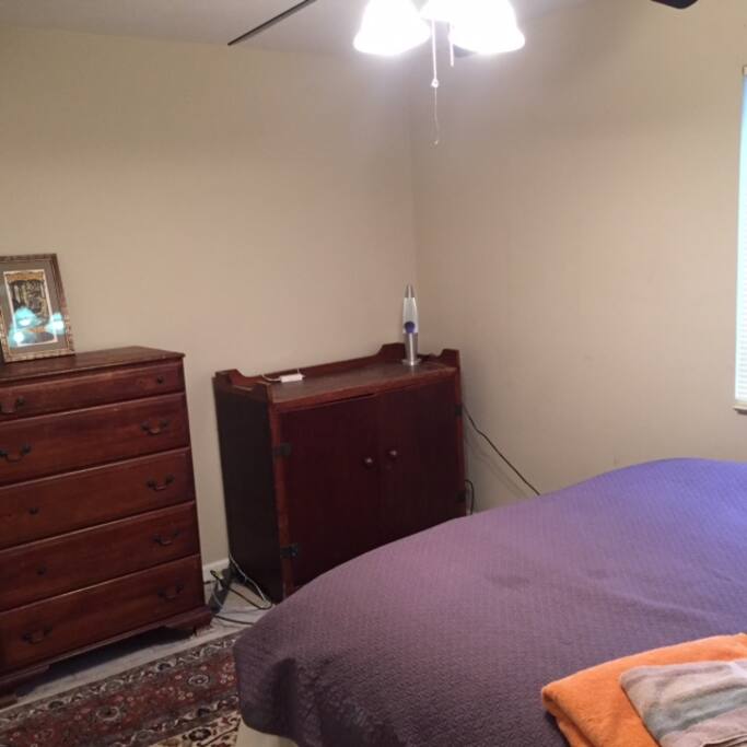 Dresser and lava lamp.
