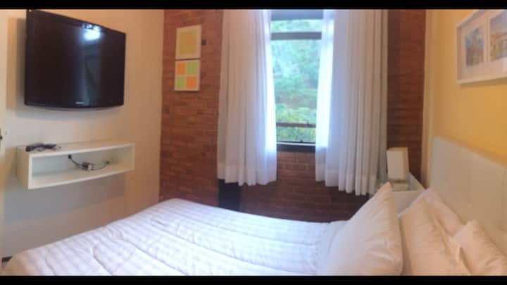 Plus a view of the bedroom with a double bed.