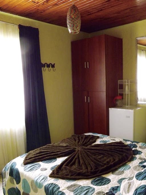 A bedroom full of light.