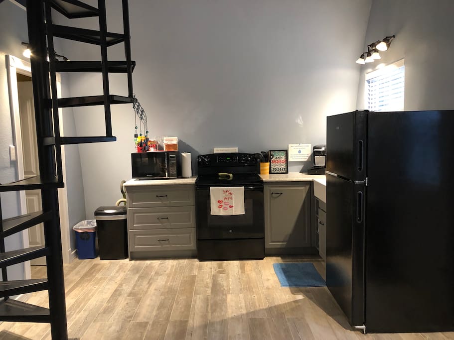 Full kitchen - stove, microwave, oven, refrigerator, and Keurig with coffee