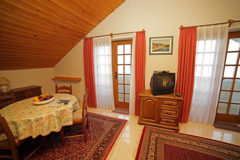 Dining area with 2 balconies facing the sea