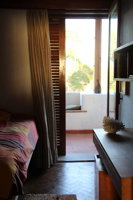Small room with cozy double bed 1,80mx1,20m. Ideal for 1 person or a loving couple