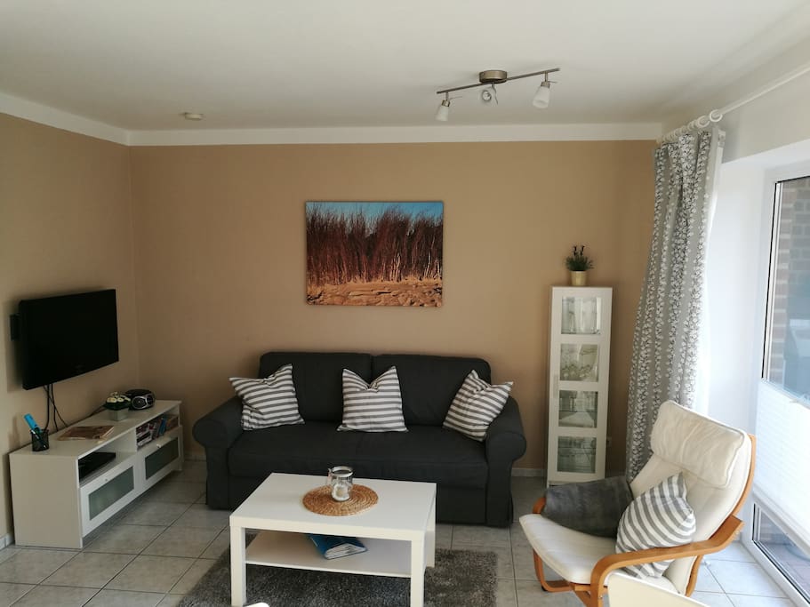 Wohnzimmer mit Schlafsofa
