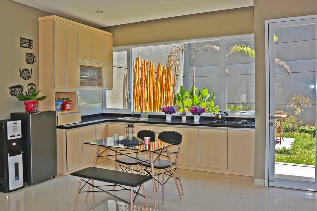 2nd floor - Kitchen: Dispenser, Fridge, Cooking and dining ware
