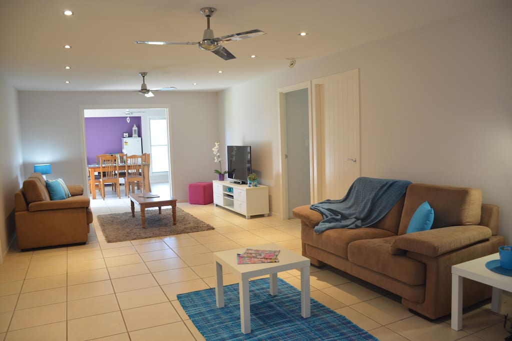Lounge with 48 inch TV and separate reading area provided for use of guests, as well as dining and basic kitchen facilities.