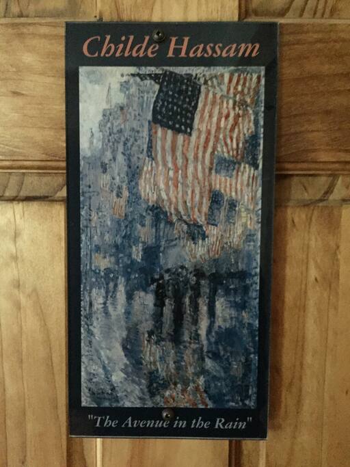 Room Features the Artwork of Childe Hassam