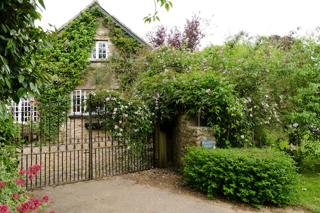 Arriving at Walders Court - come through the wrought iron gates, turn right and into the Cottage garden.