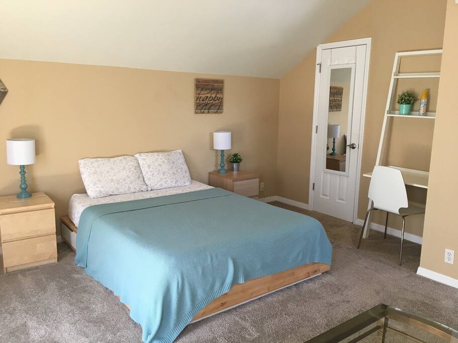 Memory foam queen bed with drawers underneath that can be used for storage.