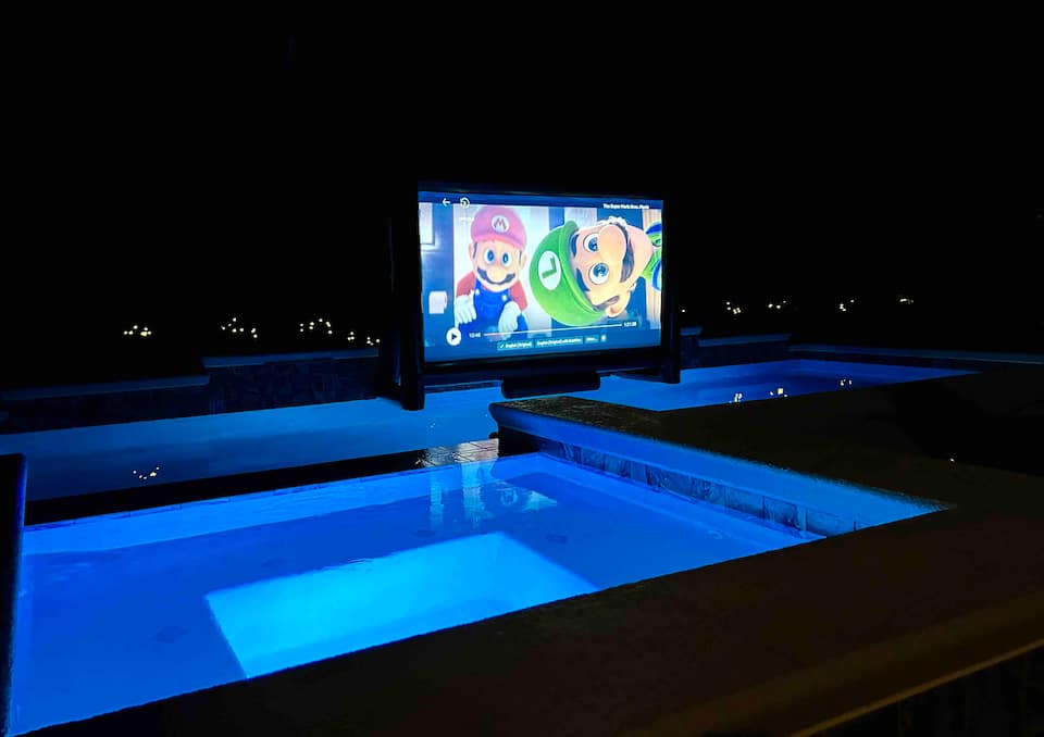 Heated sports pool and spa in the screened backyard