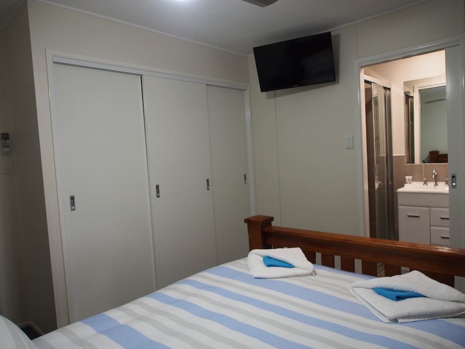 Main Bedroom - with Ensuite, TV and large wardrobe.