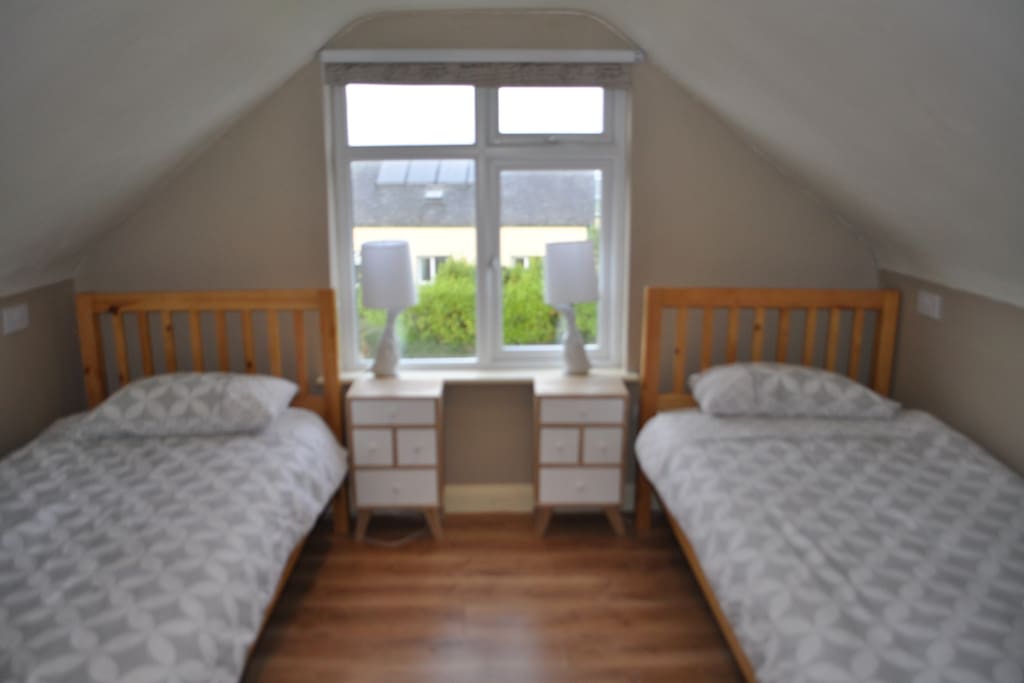 Twin Bedroom - Partial sea view