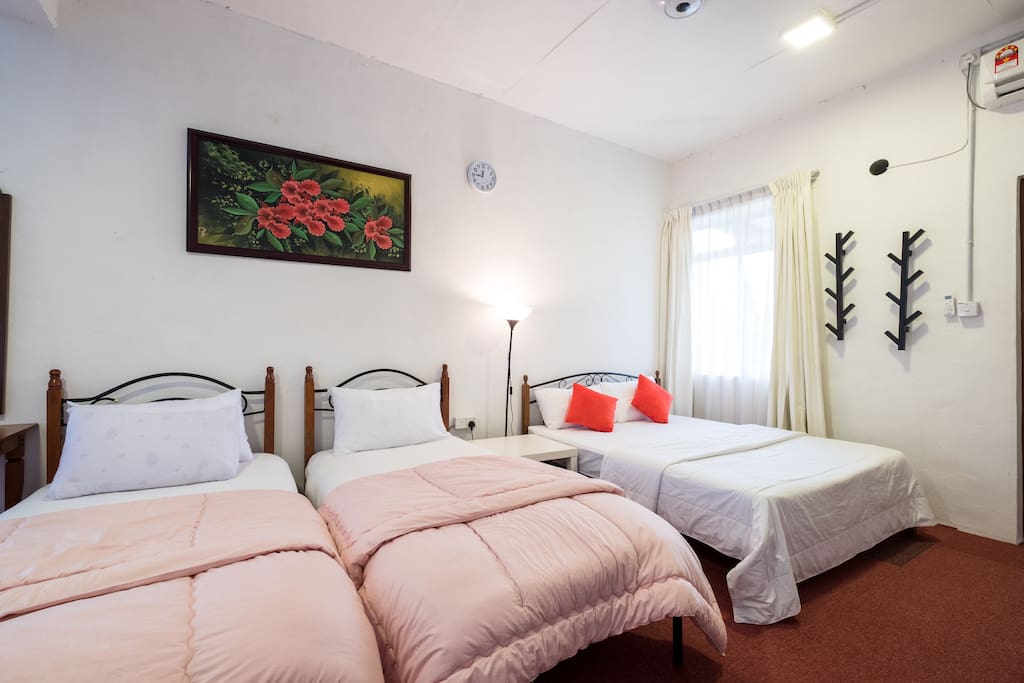 Two single beds and double bed