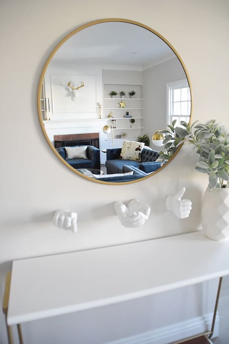console table and mirror at entry