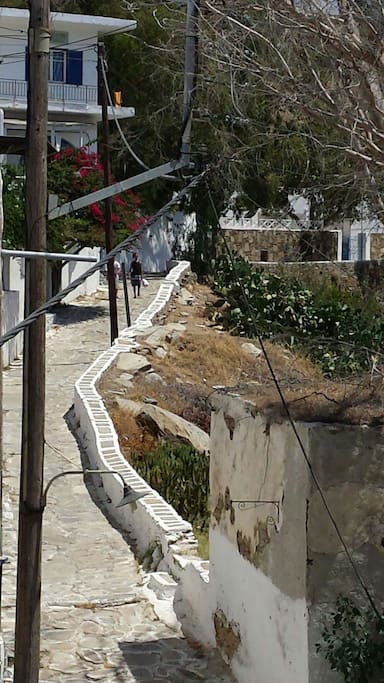 Balcony view. Traditional cycladitic step road. Ten minutes walking lead to main village. Connects Port with Chora (main village).