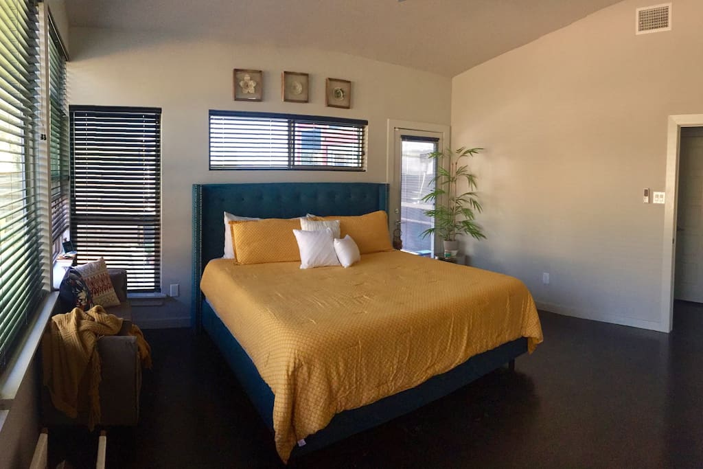 The master bedroom is a retreat paradise. Located at the back of the house, it has its on private entry. With multiple windows, it brings in the morning sunlight. The cozy king bed puts the icing on the cake.
