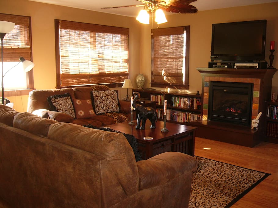 Sunroom with fireplace, tv/dvd, snacks, water, coffeepot, and small refrigerator (shared space)