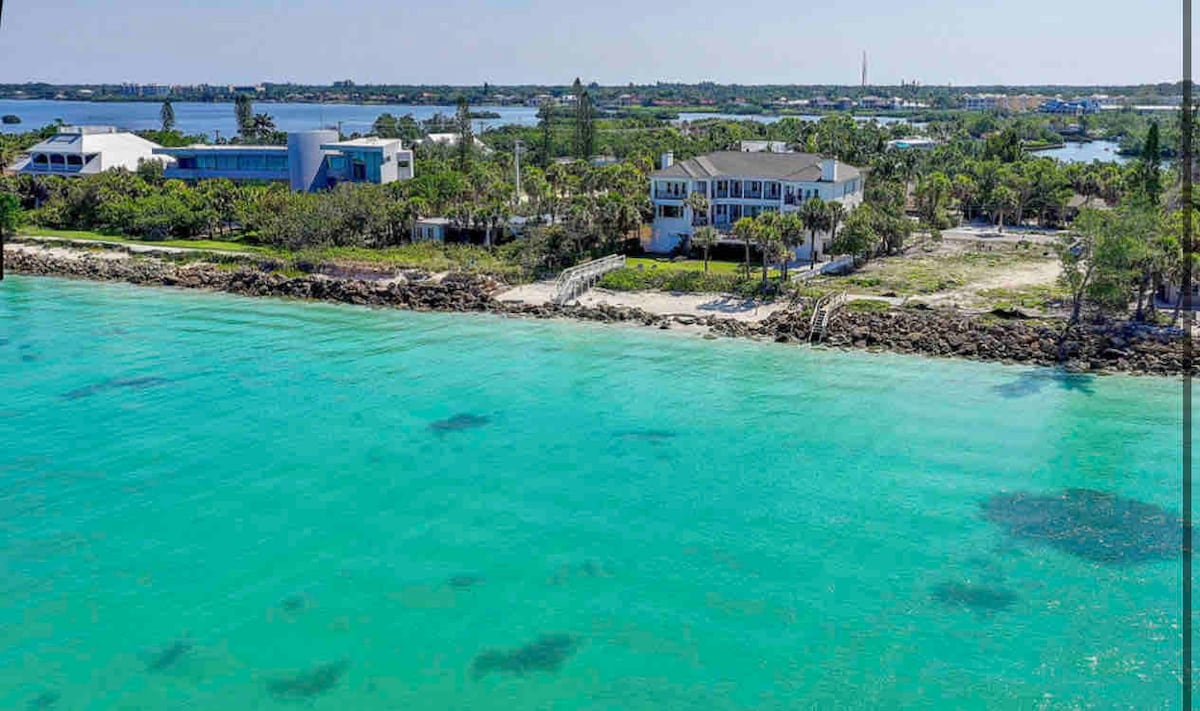 Private beachfront estate with pool.