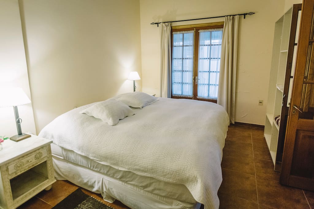 Double bedroom with access to the indoor patio
