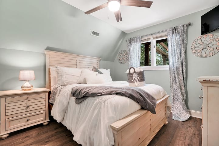 Unwind after a long day in comfortable master bedroom.